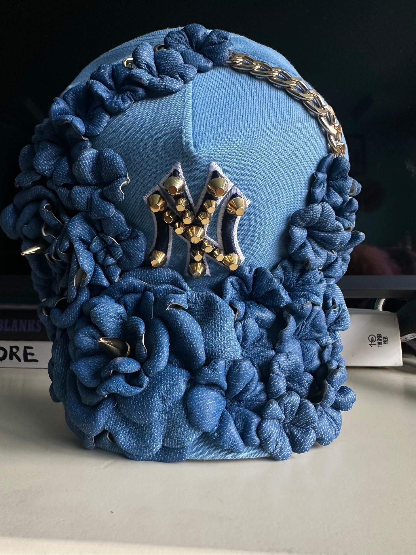 NY BLOOMS IN BLUE
